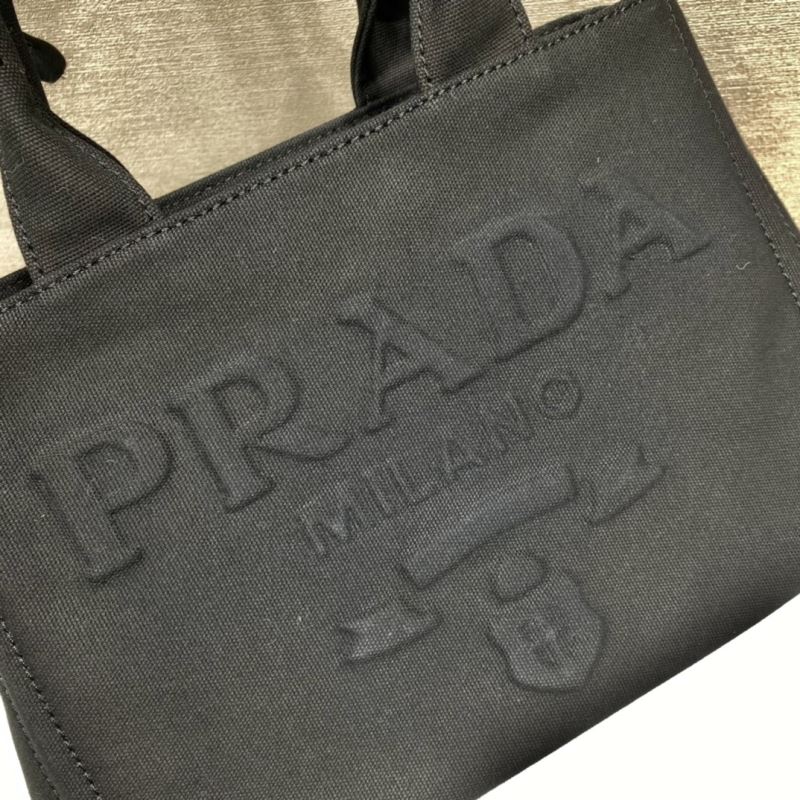 Pra*a top handle bags